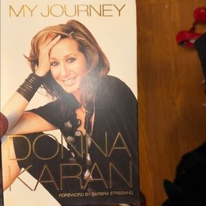 Donna Karan Memoir book shelf fashion icon style runway decor elegant louboutin